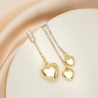 China High Quality Most Popular Creative Design Asymmetry Charm Earrings Heart Metal Stud Earrings For Girls for sale