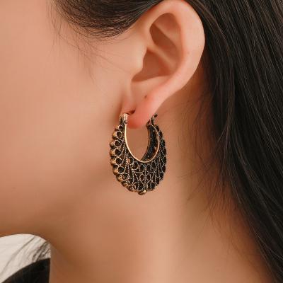 China Vintage Bohemian Vintage Ethnic Style Exaggerated Hollow Circle Earrings For Women for sale