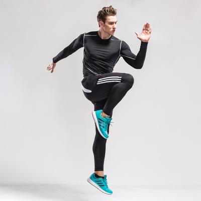 China De de Sportoverhemden van naadloze Ontwerpmensen snakken Koker Spandex/Polyestermaterialen Te koop