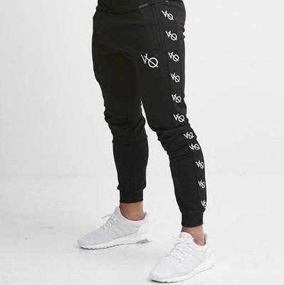 China Black Color Mens Sport Pants Custom Side Stripe Logo Printed With Elastic Closure for sale