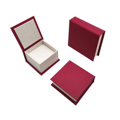 China Luxurious Red Paper Book Shaped Jewelry Set Gift Box With Foam Insert for sale