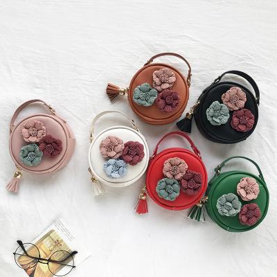 China New Small Flower Bag Simple Oblique Cross Shoulder Bag Fashionable Classic Cute Round Tassel One Female Bag for sale