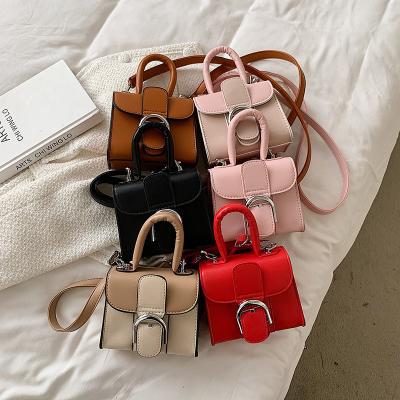 China Foreign style of the fashionable children's button mini cross horseshoe female hand bag with the Korean version of the saddle bag for sale