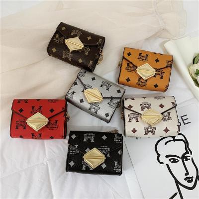 China New Fashionable Korean Children's Bag Printing Hold Lock Small Children's Little Girl Shoulder Span Bag for sale