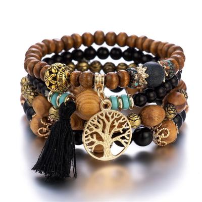 China Bohemian Multilayer Wooden Bead Bracelet Wind String Bead Bracelet Punk Hot Selling Elastic Jewelry for sale