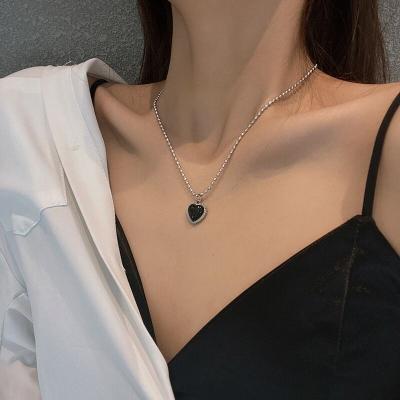 China Europe and America vintage black love necklace steel clavicle pendant necklace female simple wind titanium cold temperament chain for sale