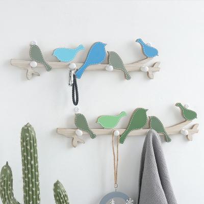 China New European fresh style rustic wooden bird hangs creative clothing store wall coat hanger family living room porch wall key bedroom hanger for sale