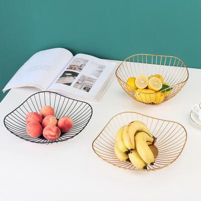 China Creative hot-wholesale metal crafts Europe iron fruit basket shape metal fruit basket family hotel bar table storage basket for sale