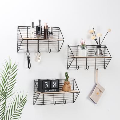 China Nordic Minimalist Wall Storage Living Room Decoration Home Shelf Home Wall Clapboard Wrought Iron Multifunctional Shelf for sale