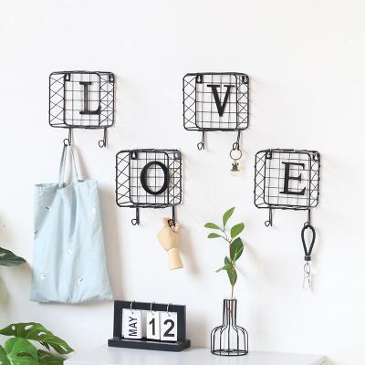 China Multi-function main storage and finishing combination INS iron art LOVE letter hook decorative home decorative hook for wall for sale