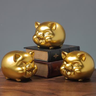 China Wholesale Cute Cartoon Shape Piggy Bank Coin Coin Creative Gold Luxury Pig Resin Material Eco-friendly Opens Children's Gifts for sale