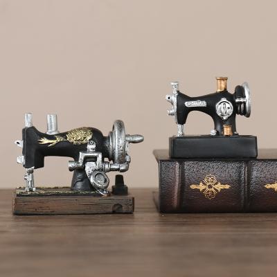 China Old-fashioned European style retro vintage mini small sewing machine model ornaments home decoration resin crafts landscape photo micro props for sale