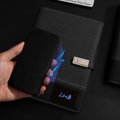 China Professional Customized Logo 8000 Power Bank With LED Light Hardcover Notebook Organizer USB Wireless Charger Agenda Folder Customized Power Bank for sale