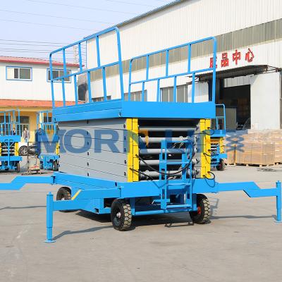 China Hydraulic towed scissor lift 8 meter scissor man lift for aerial working 1640*750mm for sale