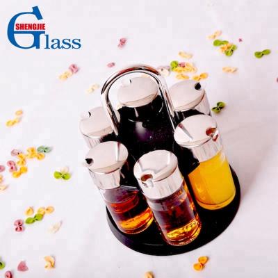 China Wholesale Food Coniments Bottles Glass Spice Oil Vinegar Spinning Bottle With Stand for sale