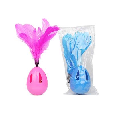 China Sustainable Pet Toy Interactive Cat Toys Feather Leakable Food Tumbler Swing Bell Ball Teased Cat Toy Wholesale for sale