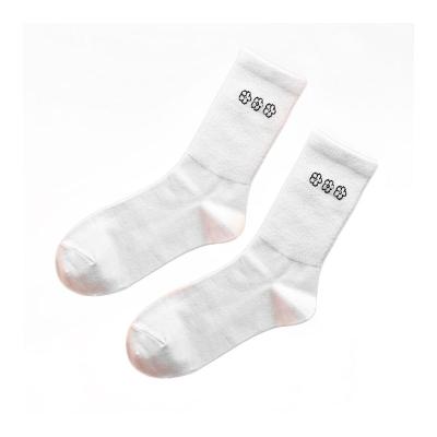 China Breathable Loose Custom Logo Jacquard White Men Knitted Embroidered Sports Solid Unisex Socks for sale