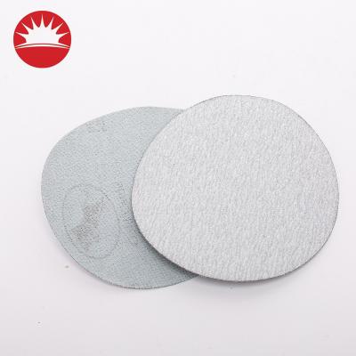 China 5 Inch 125mm White Surface Polishing High Performance Without Holes Paper Backing Sandpaper Discs for sale