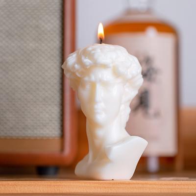 China Homemade Romantic Scented Candle Lovely David Sculpture Fragrance Soy Wax Wedding Candle Eco-friendly for sale