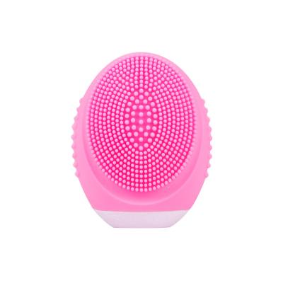 China 2022 New Design Christmas Gift Mini Electric Acne Treatment Face Remover Silicone Facial Cleaning Brush for sale