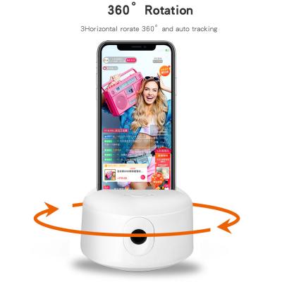 China Smart AI Algorithm Face Tracking 2020 Newest Support 360 Rotation Plastic Face Smart Mobile Phone Auto Tracking Holder for sale