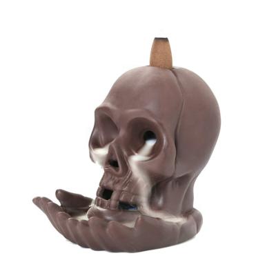 China Wholesale Custom Chinese Incense Halloween Backflow Skulls Incense Cones Holder Ceramic Censer with LED Lamp for sale