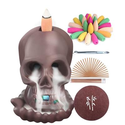 China Chinese Incense Halloween Backflow Skulls Madden Cones Holder Ceramic Censer With LED Lamp for sale