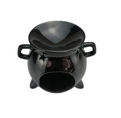 China Chinese Incense Sells Home Decor Hot Handmade Luxury Teapot Shape Black Creamic Aroma Holder Yoga Wholesale Oil Burner for sale