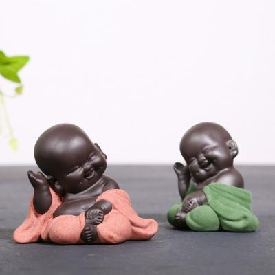 China Handmade Small China Tea Pet Monk Smiling Ceramic Laughing Buddha Statue for sale