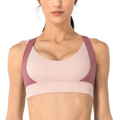 China Wholesale Breathable Sports Strappy Bras For Women Yoga Aplet Workout Padded Running Bras Medium Support Tops for sale