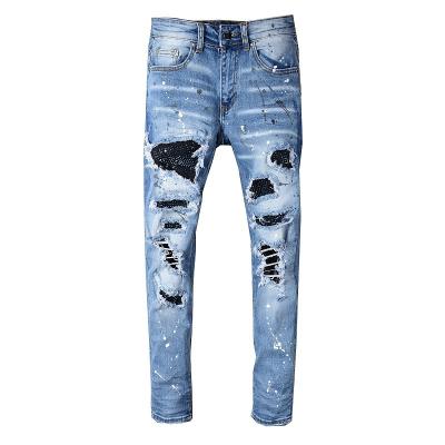 China New 2022 breathable streetstyle ripped patch and diamond-encrusted jeans young men's slim stretch pants new for sale