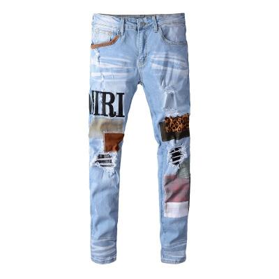 China Breathable Streetstyle Rippedjeans Patched Patch Light Blue Stretch Foot Hole Gradient Slim Jeans For Men for sale