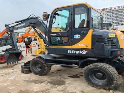 China HYUNDAI R60W Excavadora Usada Hyundai Excavadora Usada de Roda 6 TON Excavadora de Roda de Segunda Mão 60WVS à venda