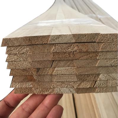 China Natural cheap price paulownia formwork construction custom color solid wood strip for sale