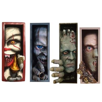 China Handwork Horror Peeping On Shelf Monster Joker Human Face Resin Bookends Library Sculpt Collect Cd Albums Shelf Decor for sale