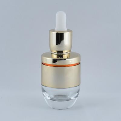 China 30ml Gold Cosmetic Wholesale Cap Essential Oil Dropper BottleBottle For Luxury Cosmetic Packaging for sale