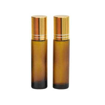 China Oi Essential Roll On Glass Bottles For Essential Oil Rollball Empty Thick Transparent Glass Brown Bottle 10ml for sale