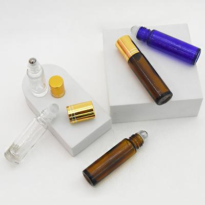 China Oi Essential Amber Blue Clear 10ml Roll Refillable Bottles Perfume Oil Roll On Glass Bottle With Rollerball for sale