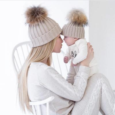 China Creative New JOINT JOINT Autumn And Winter Ambulet Fur Balls Keep Mother Baby Warm Baby Knit Hat Cold Cap for sale