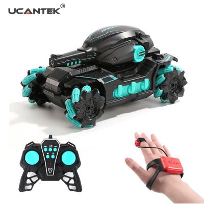 China RC Hobby 2.4G and Gesture Control Drifting RC Car Toy 360 Degree Rotation Water Bullet Shooting Remote Control Fighting Car for Kids for sale