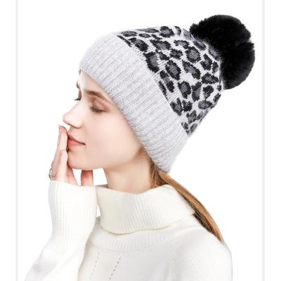 China 2021 New 100% COMMON Leopard Wool Yarn Fashion Accessories Luxury Winter Hats For Woman Women Warmly Knitted Hat Pompom Beanies for sale