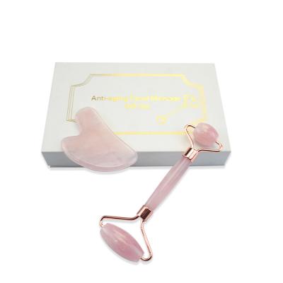 China Face Lift Rose Quartz Roller Slimming Natural Rose Quartz Jade Roller And Gua Sha for sale