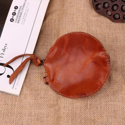 China Fashion High Quality Hot Selling Elegant Round Girl Small Genuine Leather Coin Purse for sale