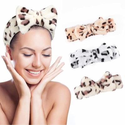 China Girls Plush Headband Wholesale Sales Plush Headband Leopard Wash Bow Coral Fleece Headband Comfortable Soft Cute Face for sale