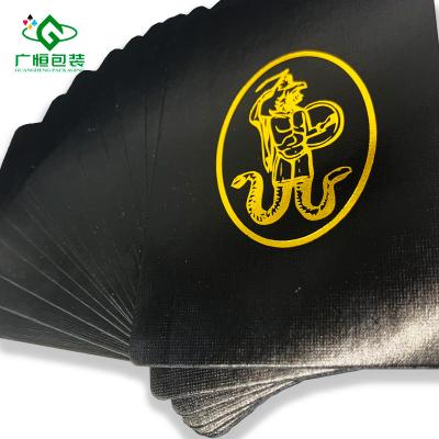 China Luxury Custom Club Logo Gold Foil Box Poker Cards Playing Cards Paper Core Casino Cloth Finish High Quality Black Playing Cards for sale