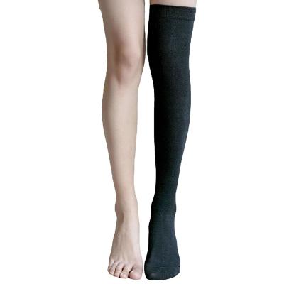 China Solid Color Sporty Women's Winter Knee High Socks High Quality Thigh High Cotton Socks for sale