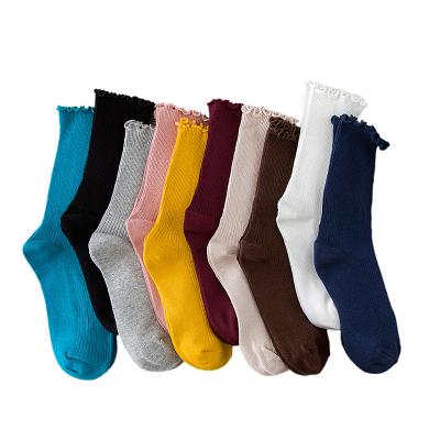 China Beautiful Sporty Cool Soft Slouch Socks Cotton Ladies Solid Color Ruffled Crew Socks Wholesale for sale