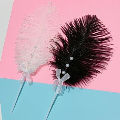 China DecorationinsWind natural net cake feather pearl fashion ostrich feather beautiful dessert red baking decorative flag for sale