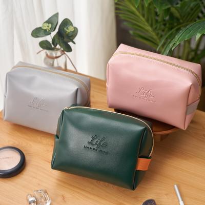 China Cool Flower Packaging PU Leather Waterproof Cosmetic Bag Women Big cCapacity for sale