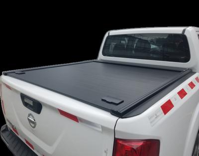 China Easy Fit Retractable Roller Flap Aluminum Alloy Tonneau Cover For NISSAN NAVARA NP300 for sale